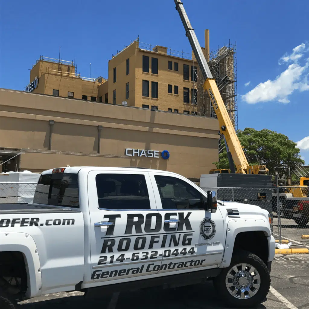 chase building with crane and t rock truck