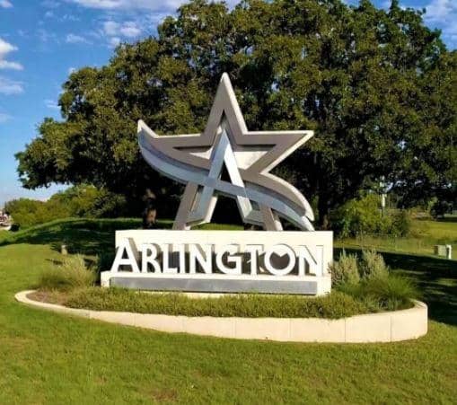 concrete sign that reads Arlington