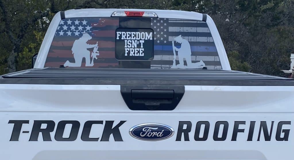 Sign on back of truck that says freedom isn't free