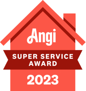 Image of a red house-shaped badge with "Angi" at the top. Below, a maroon ribbon reads "Super Service Award," and at the bottom, the year "2023" is displayed in white text.